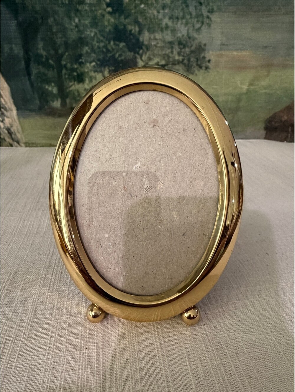 Gold oval tabletop picture frame
